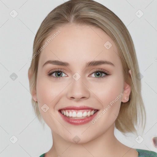 Joyful white young-adult female with medium  brown hair and green eyes