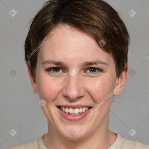 Joyful white young-adult female with medium  brown hair and grey eyes