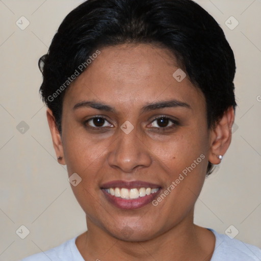 Joyful latino young-adult female with short  brown hair and brown eyes