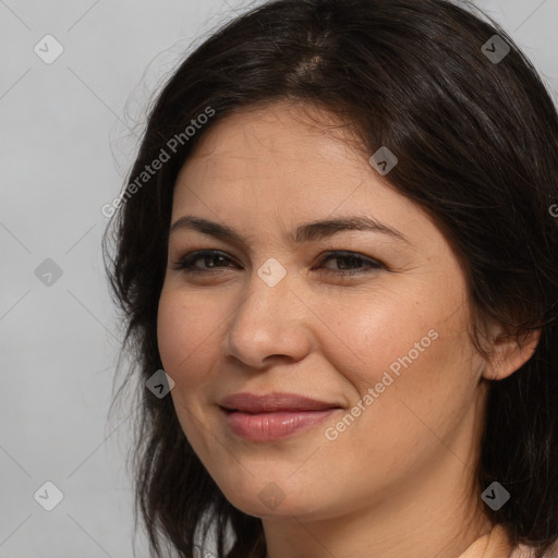 Joyful white young-adult female with long  brown hair and brown eyes