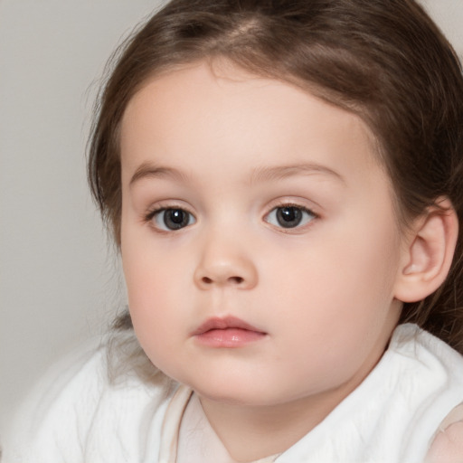 Neutral white child female with medium  brown hair and brown eyes