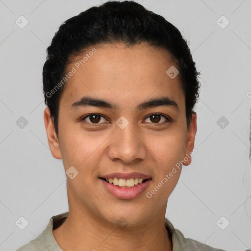 Joyful latino young-adult male with short  black hair and brown eyes