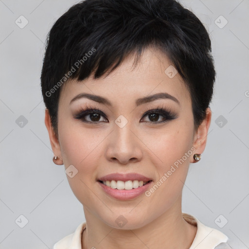 Joyful asian young-adult female with short  black hair and brown eyes