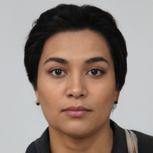 Neutral asian young-adult female with short  black hair and brown eyes