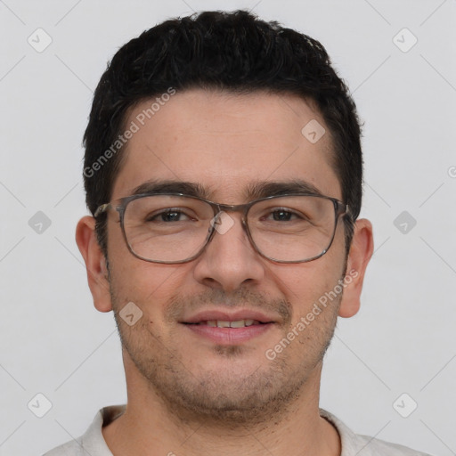 Joyful white young-adult male with short  brown hair and brown eyes