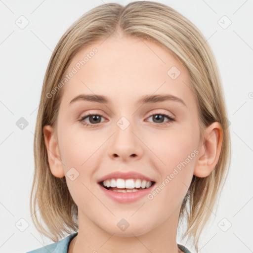 Joyful white young-adult female with medium  brown hair and blue eyes