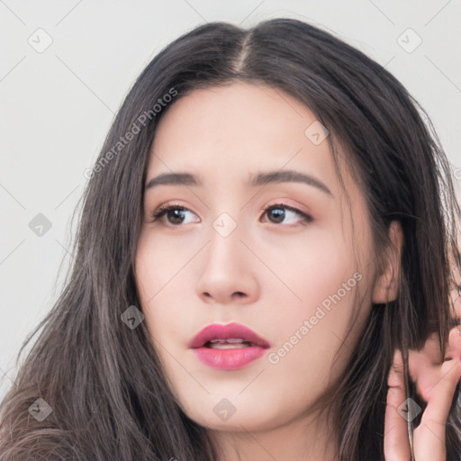 Neutral asian young-adult female with long  brown hair and brown eyes