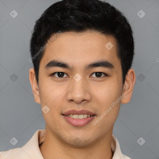 Joyful latino young-adult male with short  brown hair and brown eyes