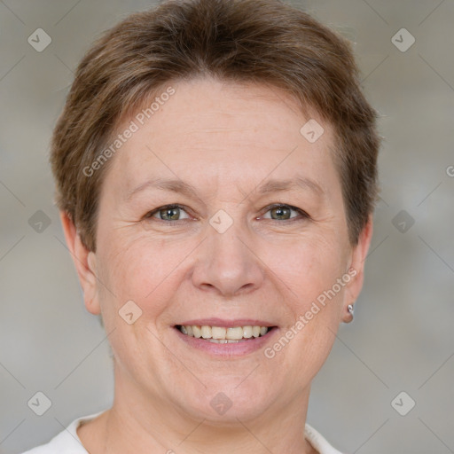 Joyful white adult female with short  brown hair and grey eyes