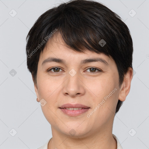 Joyful white young-adult female with short  brown hair and brown eyes