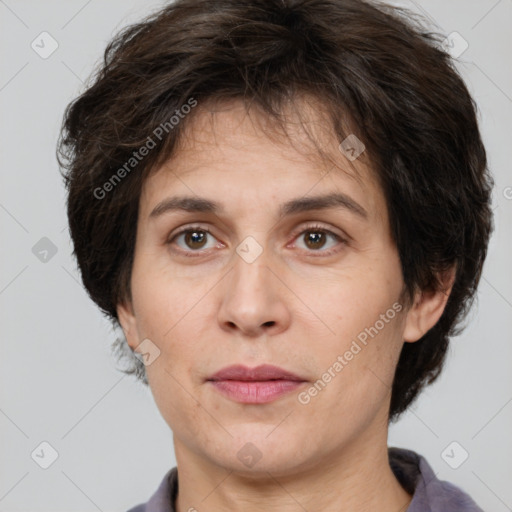 Joyful white adult female with short  brown hair and brown eyes