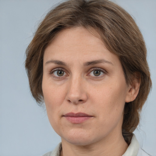 Neutral white adult female with medium  brown hair and brown eyes