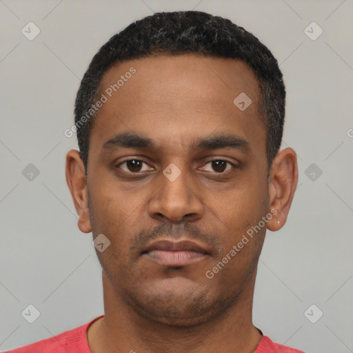 Neutral latino young-adult male with short  black hair and brown eyes