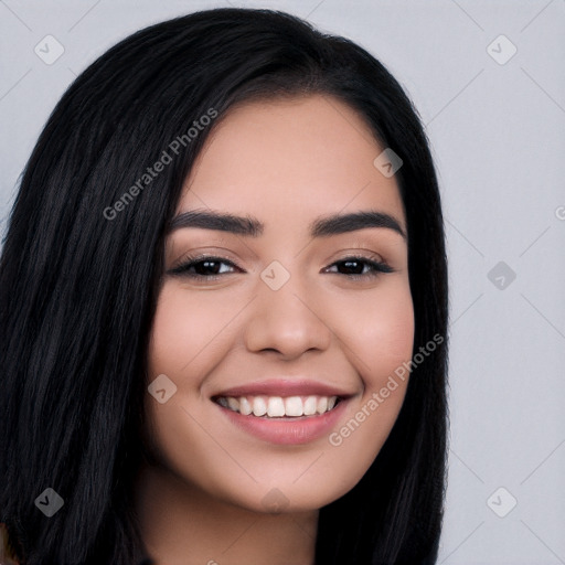 Joyful asian young-adult female with long  black hair and brown eyes