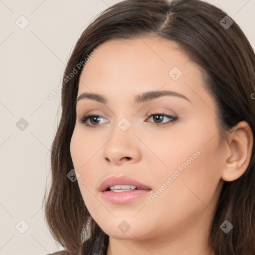 Neutral white young-adult female with long  brown hair and brown eyes