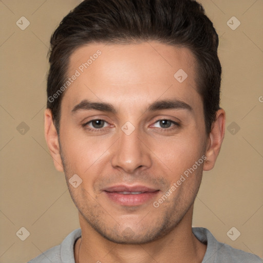 Joyful white young-adult male with short  brown hair and brown eyes