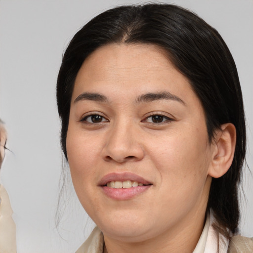 Joyful white young-adult female with medium  brown hair and brown eyes