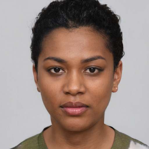 Neutral black young-adult female with short  black hair and brown eyes