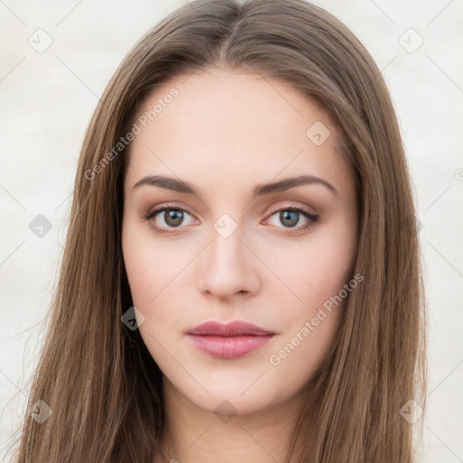 Neutral white young-adult female with long  brown hair and brown eyes