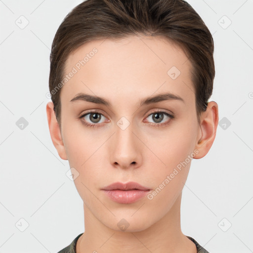 Neutral white young-adult female with short  brown hair and brown eyes