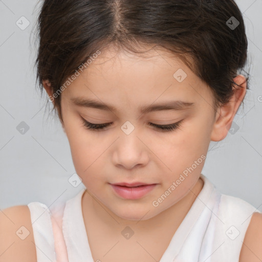 Joyful white child female with short  brown hair and brown eyes