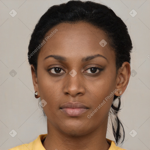 Neutral black young-adult female with short  brown hair and brown eyes