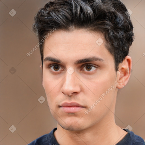 Neutral white young-adult male with short  brown hair and brown eyes