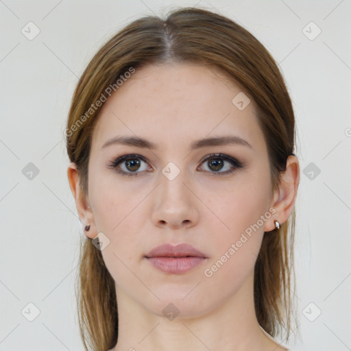 Neutral white young-adult female with long  brown hair and brown eyes