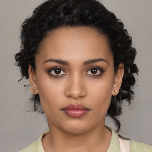 Neutral latino young-adult female with medium  brown hair and brown eyes