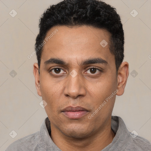 Neutral latino adult male with short  black hair and brown eyes