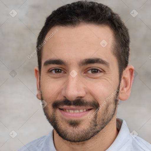 Joyful white young-adult male with short  black hair and brown eyes