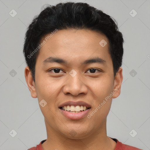 Joyful asian young-adult male with short  brown hair and brown eyes