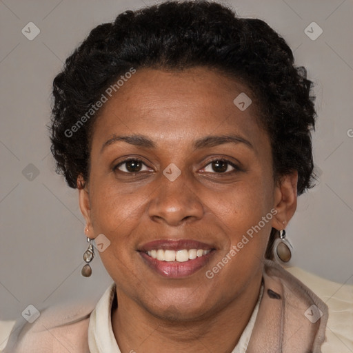 Joyful latino adult female with short  brown hair and brown eyes