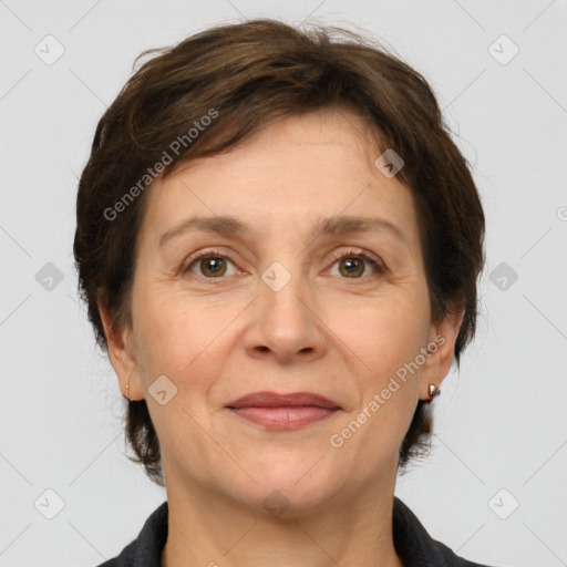 Joyful white adult female with medium  brown hair and grey eyes