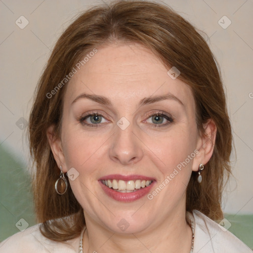 Joyful white adult female with medium  brown hair and grey eyes