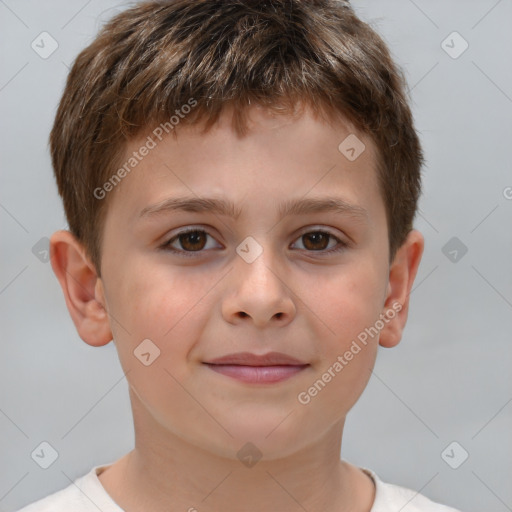 Joyful white child male with short  brown hair and brown eyes