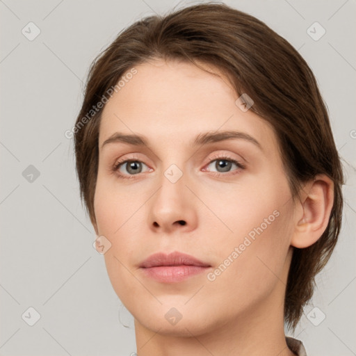 Neutral white young-adult female with medium  brown hair and grey eyes