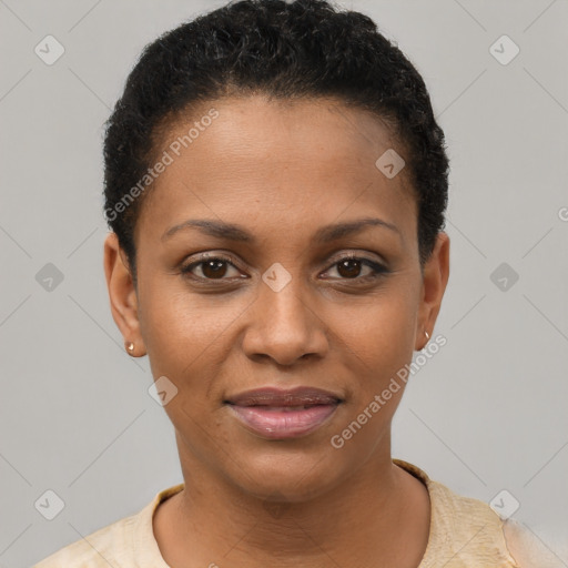 Joyful black young-adult female with short  black hair and brown eyes