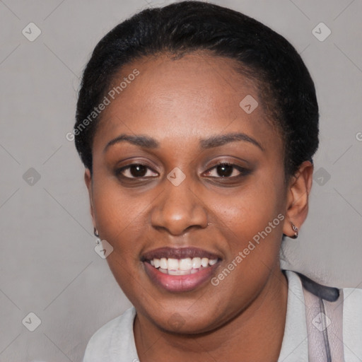 Joyful latino young-adult female with short  black hair and brown eyes