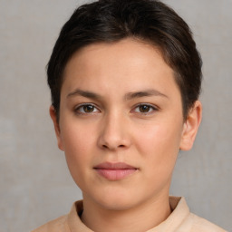 Neutral white young-adult female with short  brown hair and brown eyes