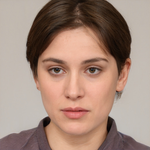 Neutral white young-adult female with medium  brown hair and brown eyes