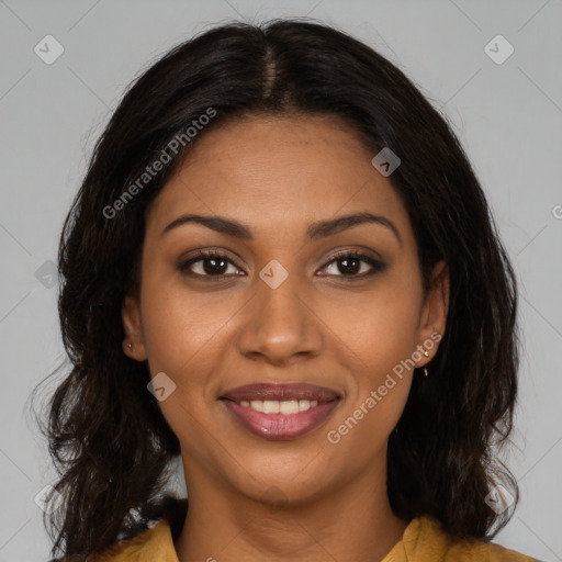 Joyful black young-adult female with medium  brown hair and brown eyes