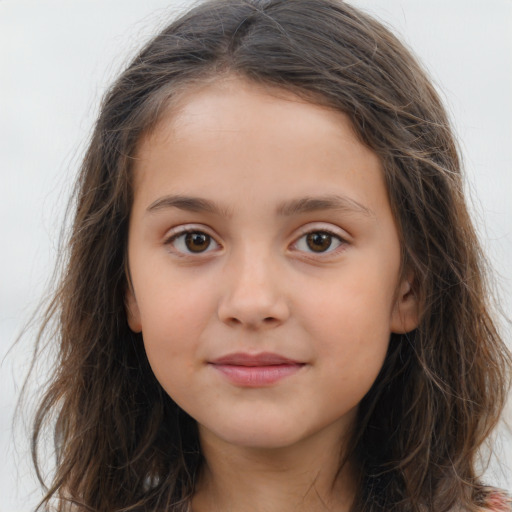 Joyful white child female with long  brown hair and brown eyes