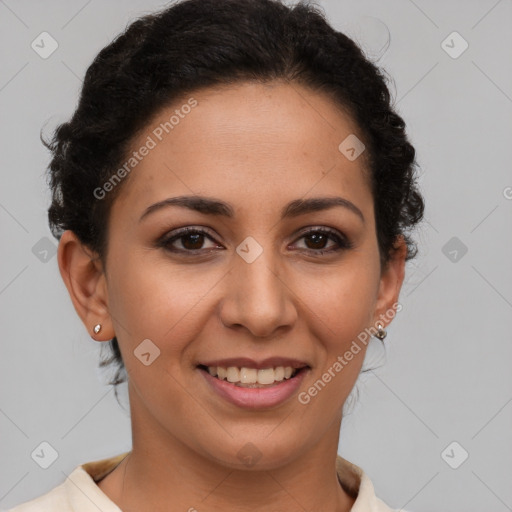 Joyful latino young-adult female with short  brown hair and brown eyes