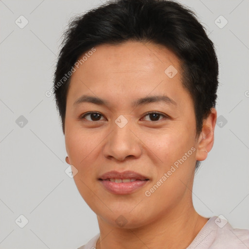 Joyful asian young-adult female with short  brown hair and brown eyes