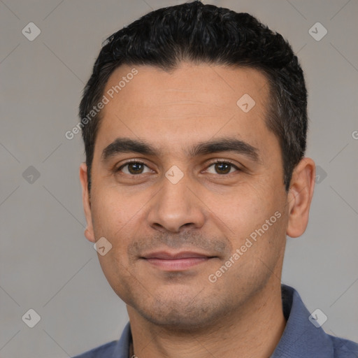 Joyful white young-adult male with short  black hair and brown eyes