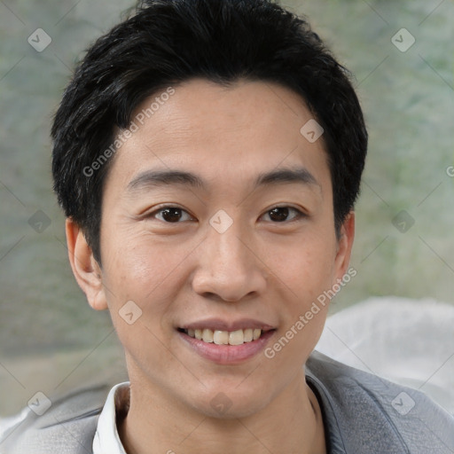 Joyful white young-adult male with short  black hair and brown eyes