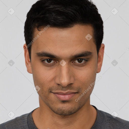 Joyful latino young-adult male with short  black hair and brown eyes