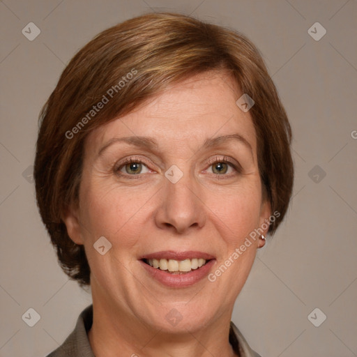 Joyful white adult female with medium  brown hair and grey eyes