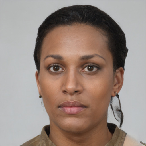 Neutral black young-adult female with short  brown hair and brown eyes